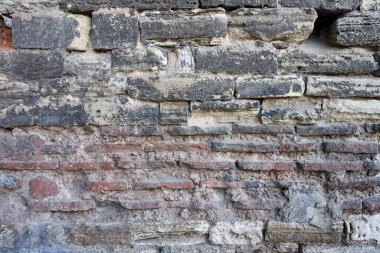 Eski taş duvar dokusunu örüyor.