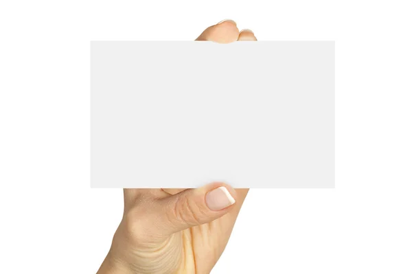 Dedos sosteniendo una tarjeta en blanco — Foto de Stock