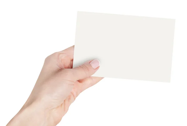 Womens fingrar håller ett tomt visitkort — Stockfoto