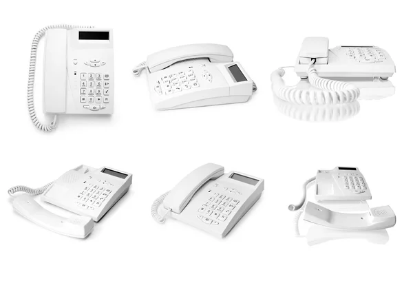 Collection of white telephones on white — Stock Photo, Image