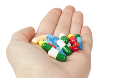 Pills in the hand. Medicine concept