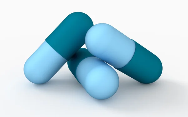 Concepto de medicina. Tres píldoras cápsula — Foto de Stock
