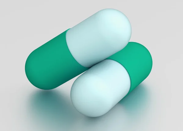 Dois comprimidos para cápsulas. Conceito de medicina — Fotografia de Stock
