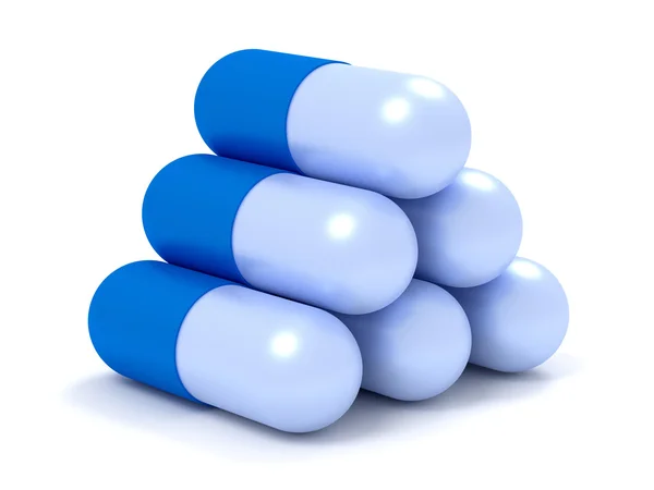Капсульные таблетки изолированы на белом — стоковое фото
