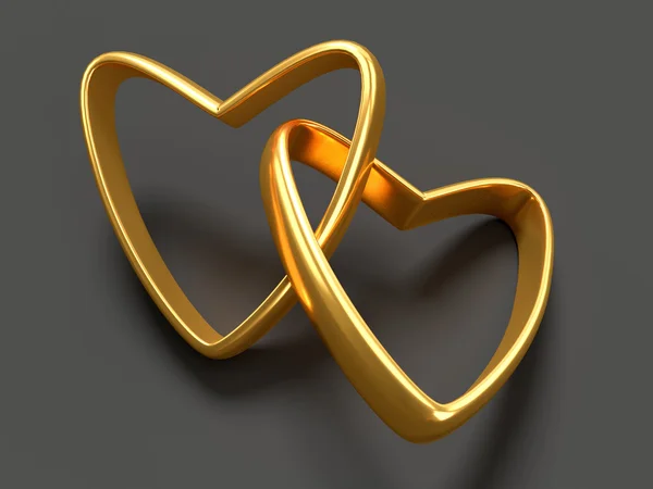 Two gold hearts rings — Stock Photo, Image