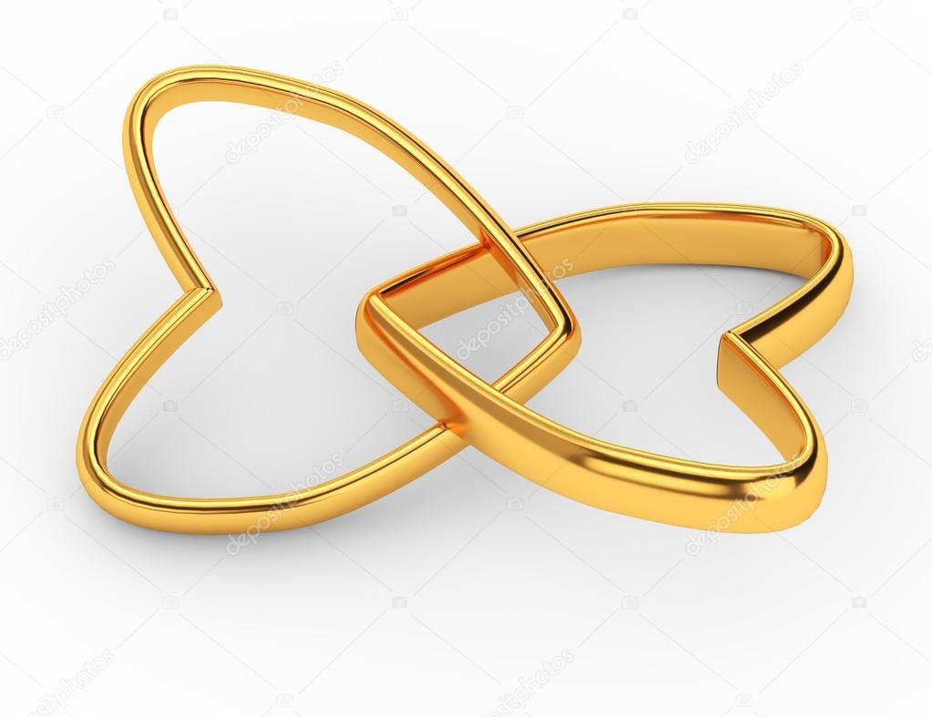 Two gold hearts rings isolated on white