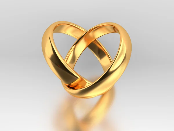 Heart with rings and reflection — Stock Photo, Image