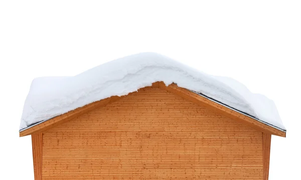 Casa in legno con la neve sul tetto — Foto Stock