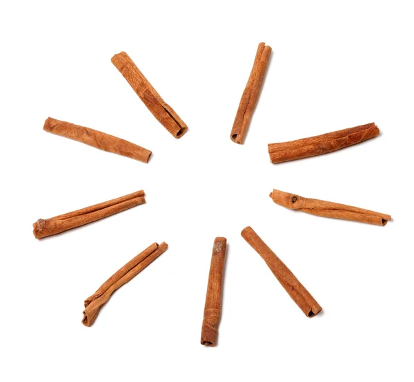 Cinnamon sticks in form of sun — Stock Photo, Image