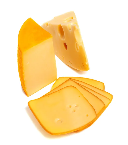 Pieces and slices of cheese — Stock Photo, Image