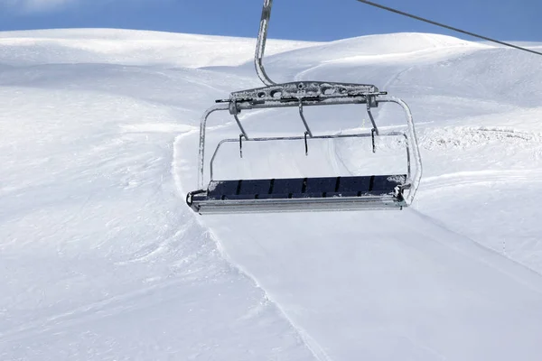 Ski Slope Chair Lift Falling Snow Ski Resort Blue Sky — Stock Photo, Image