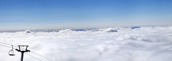 Panorama of mountains under clouds at nice sun day — Stock Photo, Image