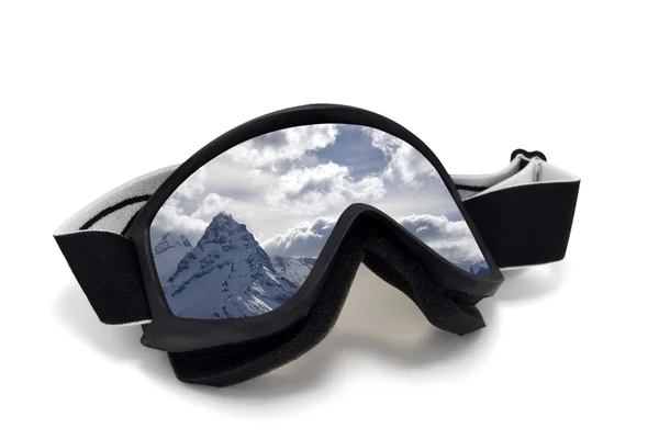 Ski goggles with reflection of snow mountains — стоковое фото