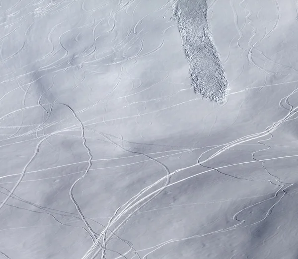 Off-piste slope with traces of skis, snowboarding and avalanche — Stock Photo, Image