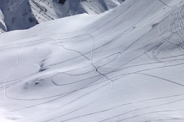 Top view on snowy off piste slope with trace from ski and snowbo — Stock Photo, Image