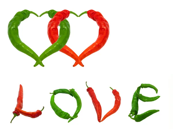 Two hearts and word Love composed of green and red chili peppers — Stock Photo, Image