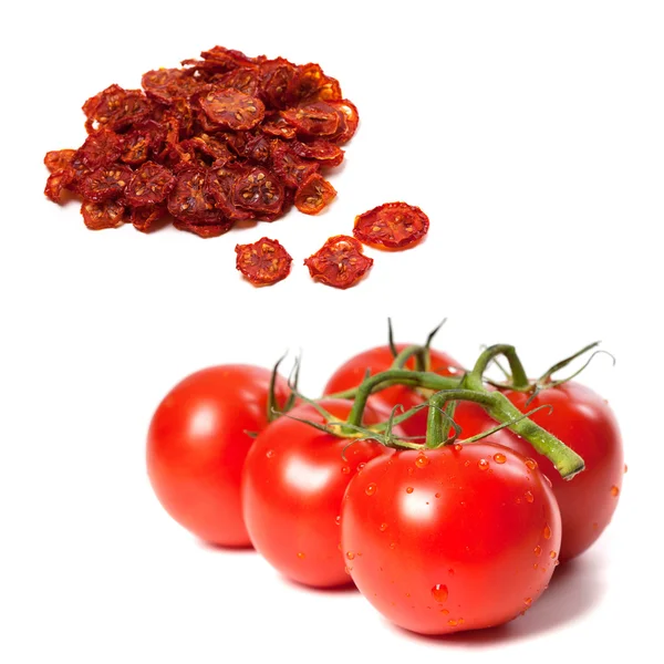 Ripe tomato on bunch and dried slices of tomato — Stock Photo, Image