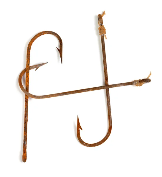 H-shaped old rusty fish hooks — Stock Photo, Image