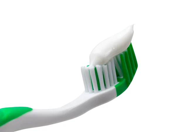 Zielona szczoteczka do zębów z pasty do zębów — Zdjęcie stockowe