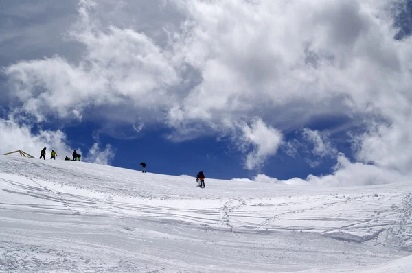 Ski slope in sun wind day — Stock Photo, Image