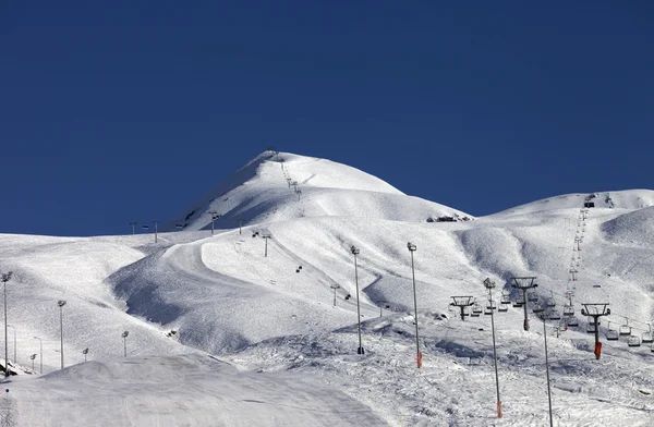 Ski slope at sun evening — Stock Photo, Image