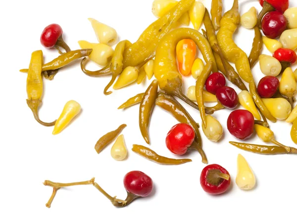 Mix of hot pickled peppers on white background — Stock Photo, Image