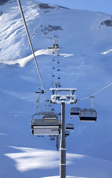 Chair-lift at early morning after snowfall — Stock Photo, Image