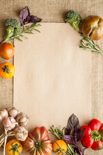 Vegetables and herbs with empty recipe blank on a sackcloth — Stock Photo, Image