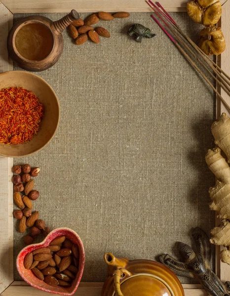 Nuts, saffron and incense with a copy space — Stock Photo, Image