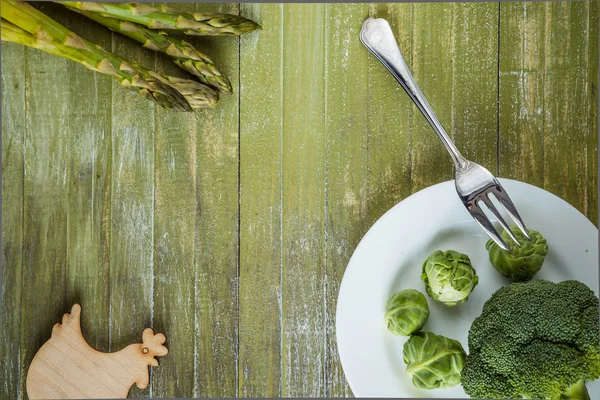 Raw broccoli with cabbage and asparagus — Stock Photo, Image