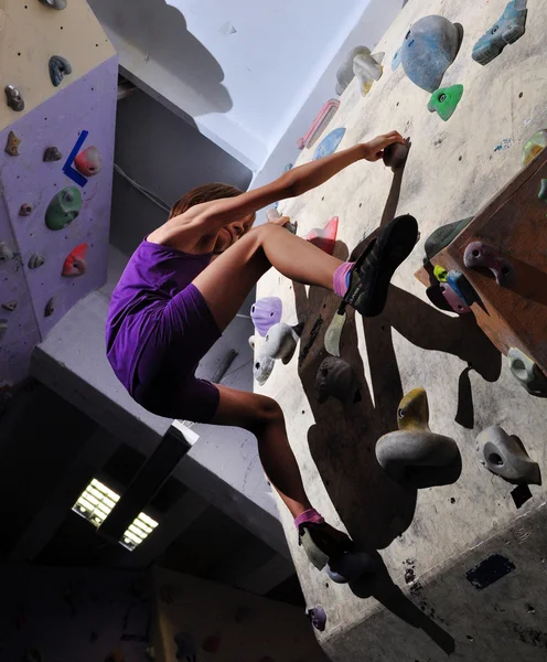 Child exercising and rock climbing — Stock Photo, Image