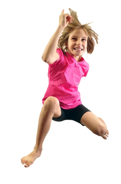 Niño haciendo ejercicio y saltando — Foto de Stock