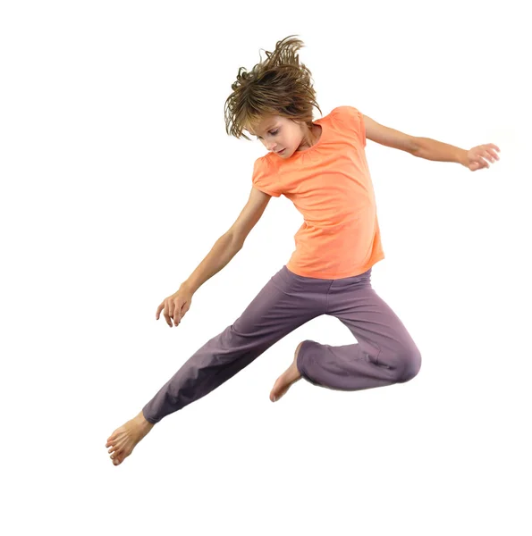 Happy schoolgirl with backpack jumping — Stock Photo, Image