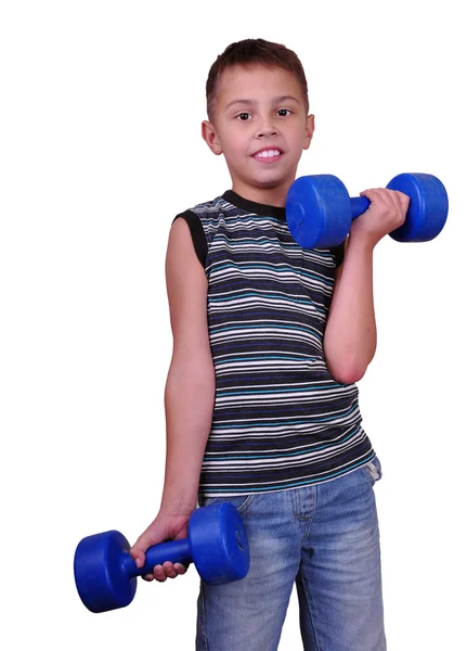 Retrato aislado del niño haciendo ejercicio con pesas — Foto de Stock