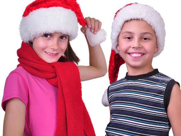 Bot e menina com Natal Papai Noel chapéus vermelhos — Fotografia de Stock