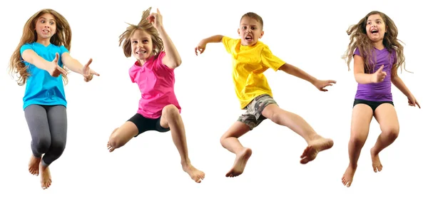 Happy children exercising and jumping — Stock Photo, Image