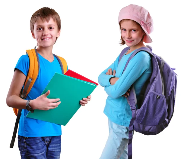 Uczniowie szkoły podstawowej z plecaka i książek — Zdjęcie stockowe