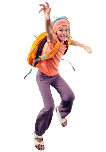 Happy schoolgirl or traveler exercising, running and jumping — Stock Photo, Image