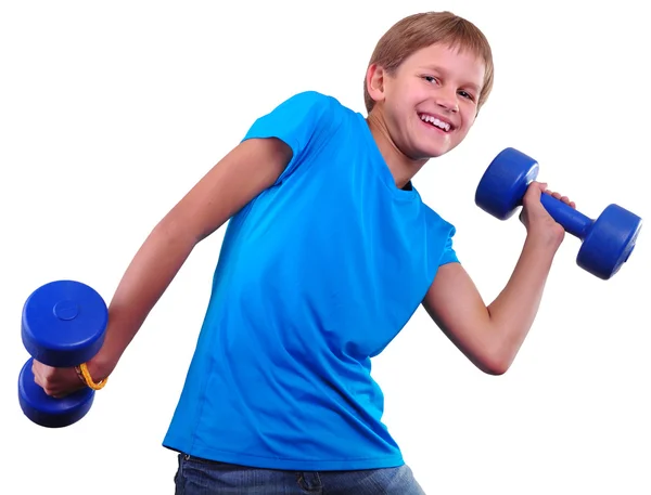İzole dumbbells ile egzersiz gülümseyen çocuk portresi — Stok fotoğraf