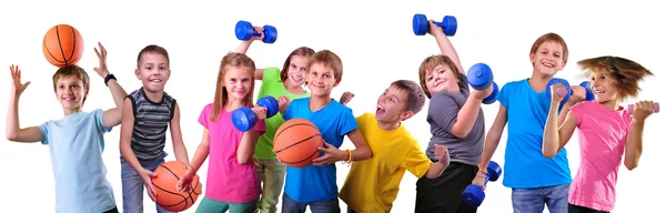 Team di amici sportivi per bambini con manubri e palla Fotografia Stock