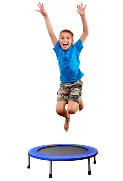 Niño haciendo ejercicio y saltando en un trampolín —  Fotos de Stock