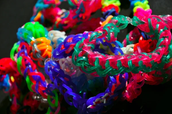 Rainbow colors rubber bands loom bracelets — Stock Photo, Image