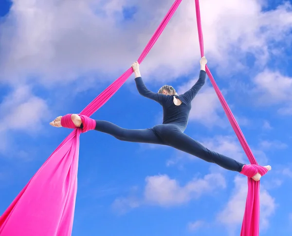 Child hanging in beautiful summer sky — Stock Photo, Image