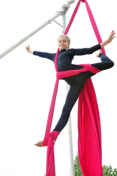 Cheerful child training on aerial silks — Stock Photo, Image