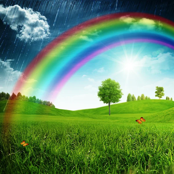 Summer background with beauty rainbow — Stock Photo, Image