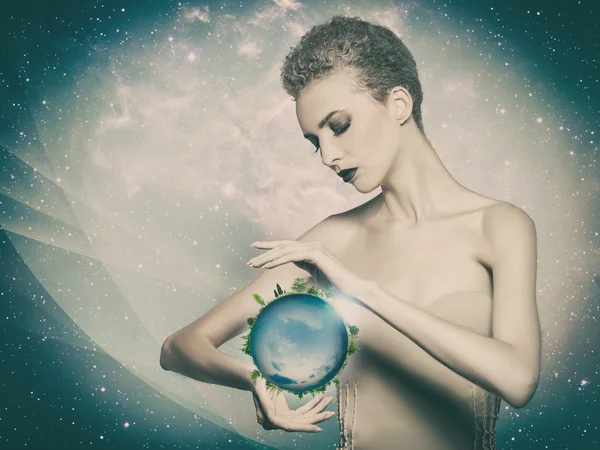 Planet in female hands — Stock Photo, Image
