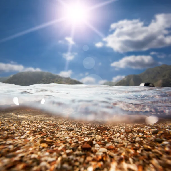 Фоновый песок на пляже под водой — стоковое фото