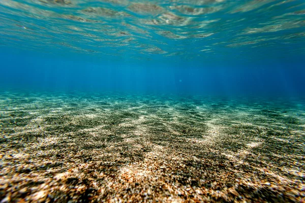 Fond sable sur la plage sous l'eau — Photo