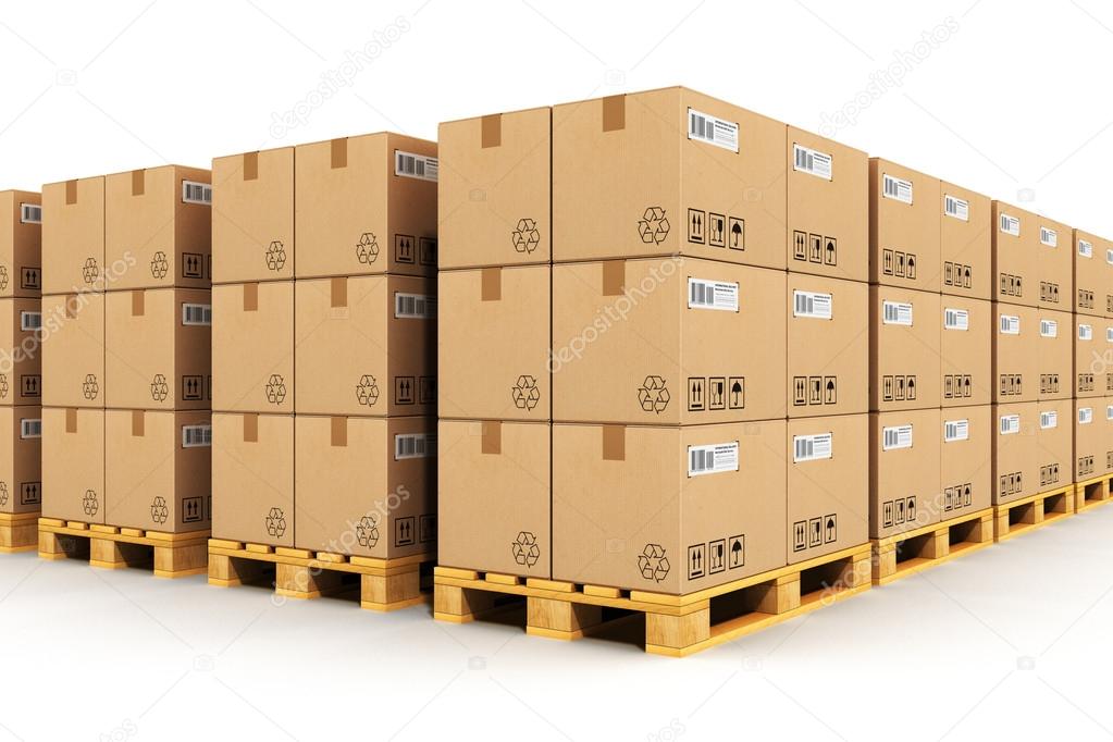 Warehouse with cardbaord boxes on shipping pallets Stock Photo by