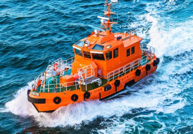 Rescue or coast guard patrol boat clipart